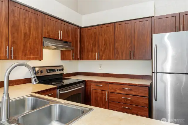 Another angle of this open style kitchen showcases the flow as well as the light & bright feel.