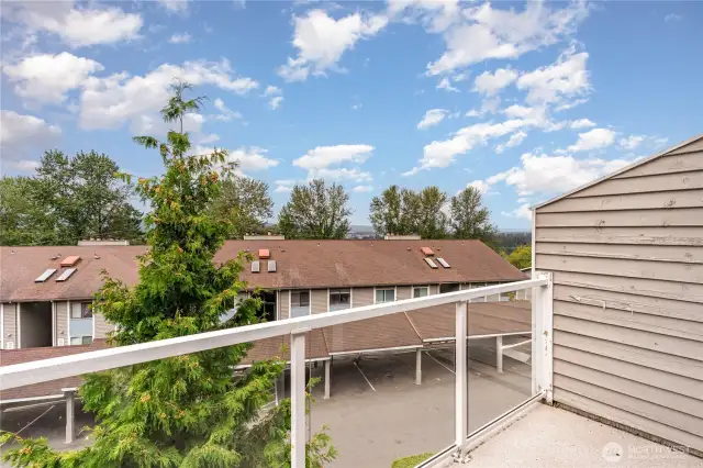 Spacious condo balcony—ideal for morning coffee or evening relaxation.