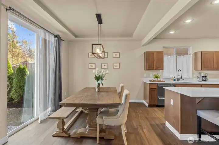 Lovely off set dining area overlooks the back yard