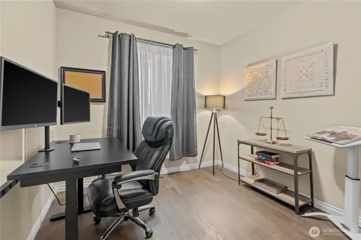 Main floor den is perfect for a work from home space