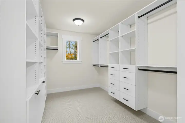 Ample room in primary walk-in closet