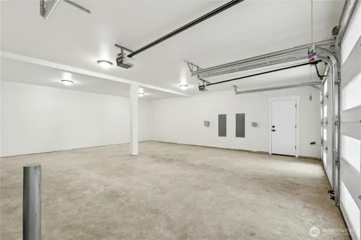 Huge garage, potentially could fit 4 vehicles or room for additional storage