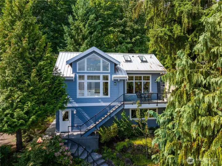 Detached 3-car garage with full ADU above