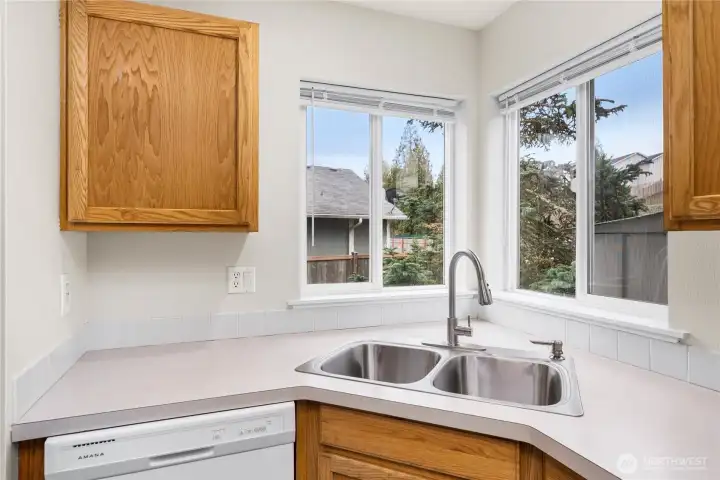 Corner sink window brings in great light