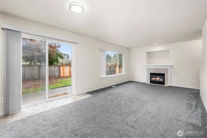 Gas fireplace and sliding door to back yard