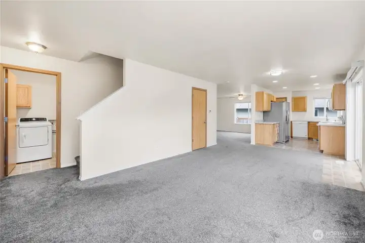 Stairway to go upstairs from utility/mud room