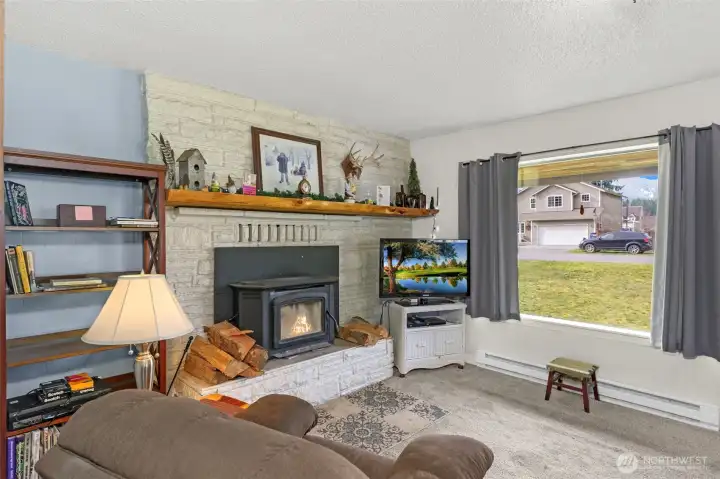 $5,000 updated wood stove and live edge wood mantle