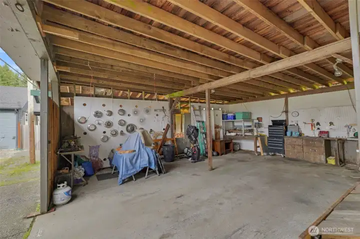 Inside 2 bays of carport