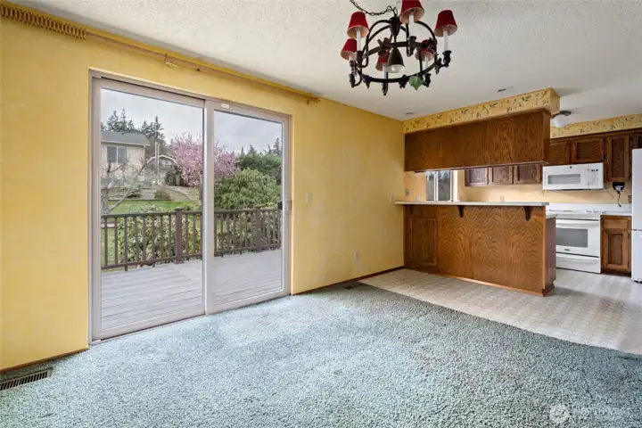 Dining room looking into kitchen .