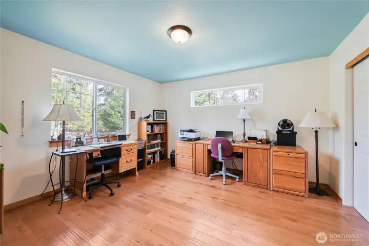 The third bedroom, off the entry, is large enough for a multitude of uses: office, media room, and more.