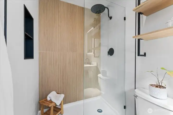 Custom walk-in shower with accent wall