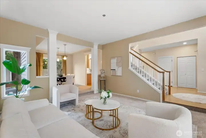 Front entry hallway, living room & formal dinning room