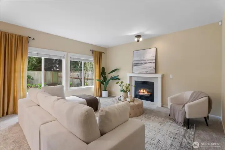 Family room with gas fireplace & garden windows