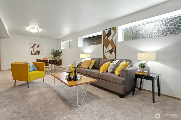 Daylight level family room with room for multiple activities