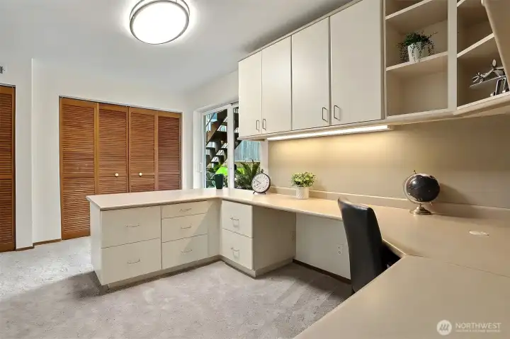 Spacious office with built-ins and access to rear yard