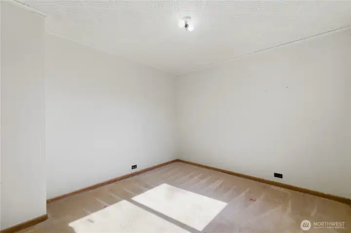 one of two main floor bedrooms