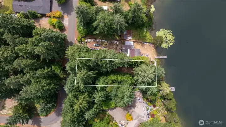 Built in privacy with all of these gorgeous trees, yet it's a ready-to-drive-in lot! All of the hard work has been done!