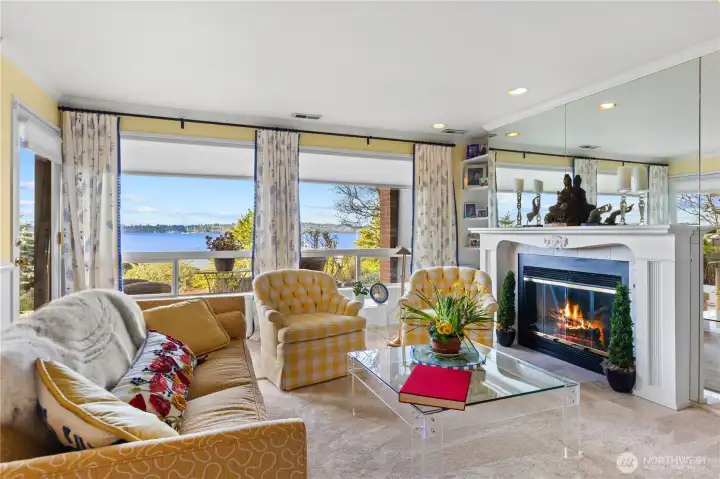 Formal living room with gas fireplace.