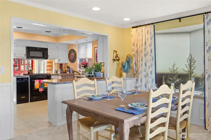 Formal dining room conveniently located adjacent to the kitchen.