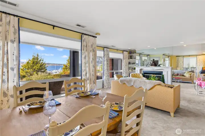 Dining room with view windows and natural light.