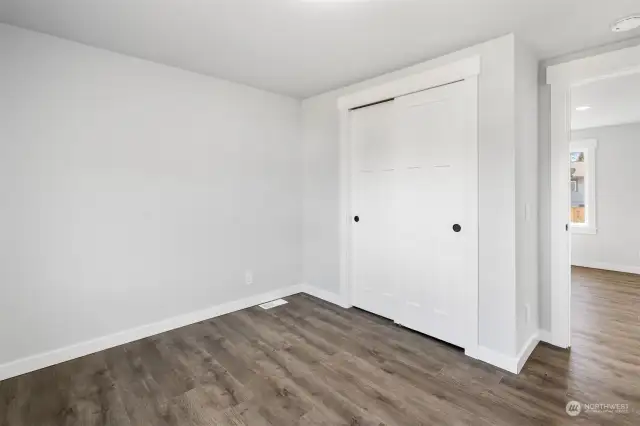 Second guest bedroom with closet.