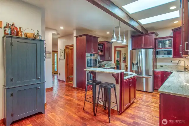 This floor plan is well planned for easy access to all spaces. Front entry to the left, dining room to the right. Back door to decking and bbq area located behind photographer position.