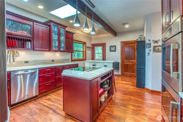 Solid door to pantry, to the left is back door w/window to covered deck area.