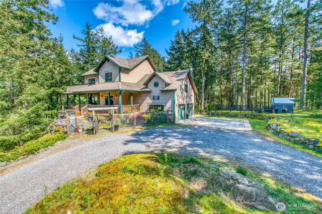 Private, plenty of open space, circular driveway, natural landscaping, easy care.