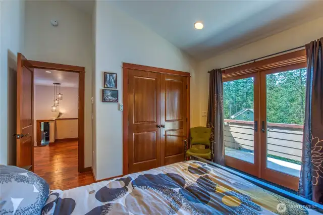 Guest bedroom opens up to LARGE hallway, big closets and outdoor space.