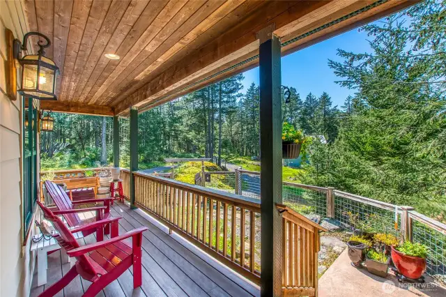 Cover front porch invites you outdoors all year long.