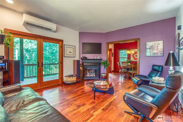 Living room looks into formal dining room.
