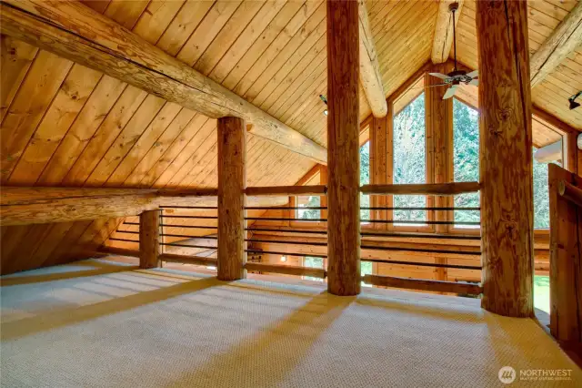 This loft area has lots of possible uses.