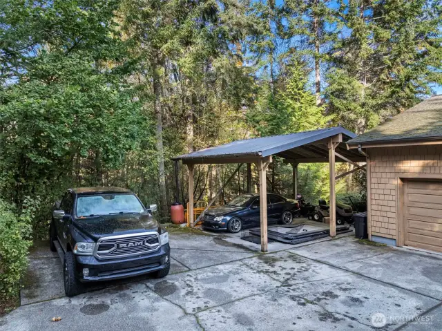 Large carport W/ metal roof. Extra parking