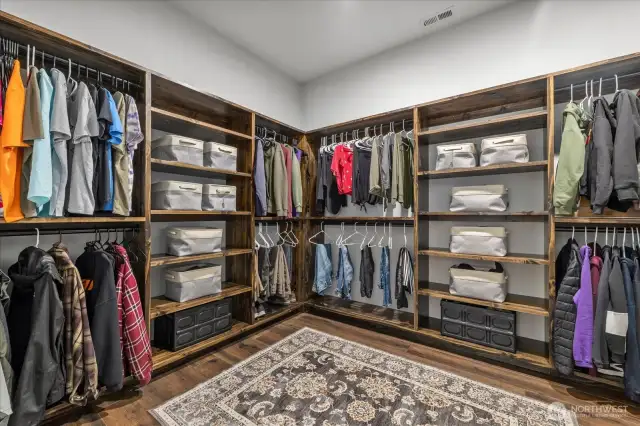 Must see walk in primary closet with custom built shelving!