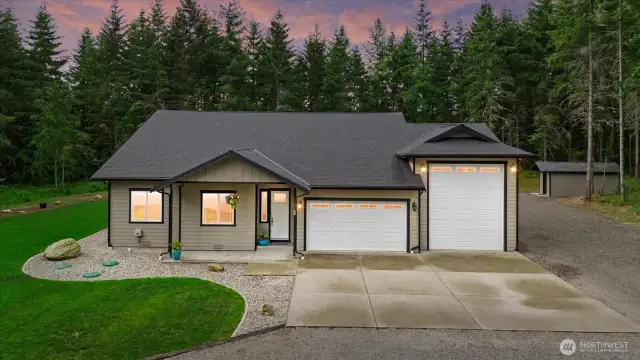 Beautiful view of 18705 232nd Ave E!  Covered tongue and groove porch leads you home.  4 bedroom septic!
