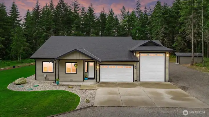 Beautiful view of 18705 232nd Ave E!  Covered tongue and groove porch leads you home.  4 bedroom septic!