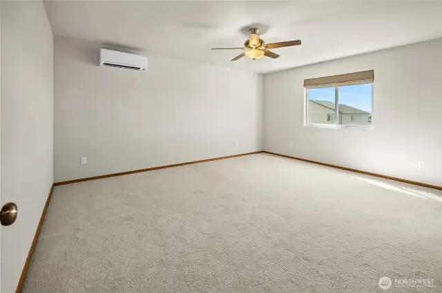 Large Primary Bedroom - upgraded heat pump system to make sure you are cool in the summer and warm in the winter!