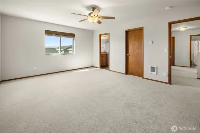 Large Primary bedroom with walk-in closet and bathroom