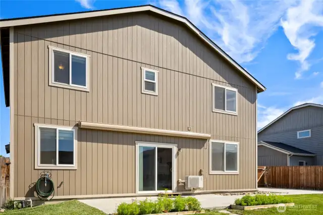 Extra large patio extends to the side of the home AND has a retractable awning to give you shade from the sun!
