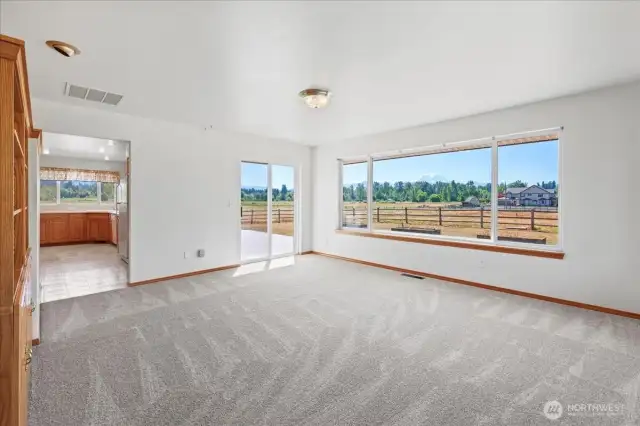 Family room with view and slider that leads to back deck
