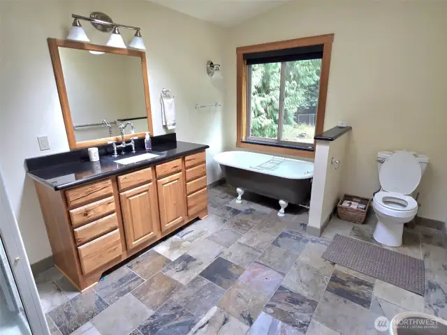 primary bath suite with slate floors, claw tub
