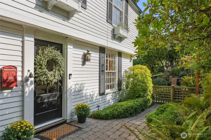 Private front door is tucked asway from the street affording privacy.