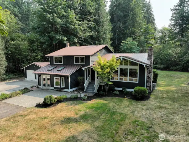 Located amongst the grand estates of Ring Hill in Woodinville, this stunning home and property is a private paradise. The area is known for its lush green spaces and quiet streets, offering  a serene and comfortable living environment.