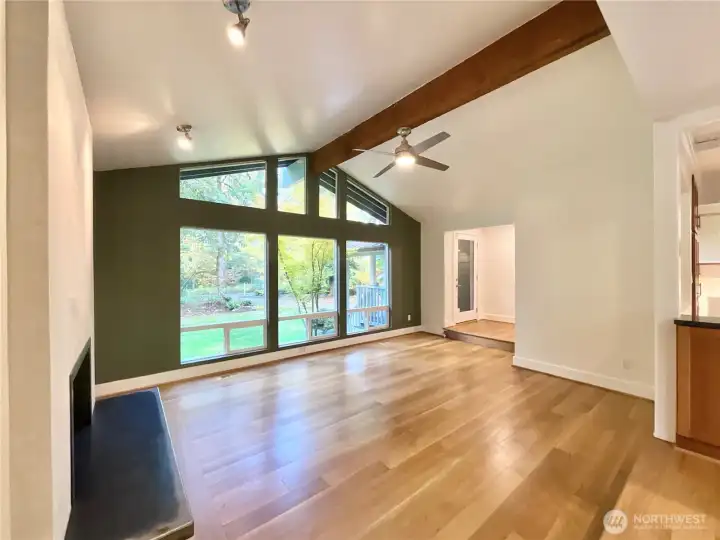 Feel connected to the outdoors with soaring ceilings and huge picture windows to enjoy the amazing park like views of your very own 1.59 acres in the Ring Hill Forest area of Woodinville.