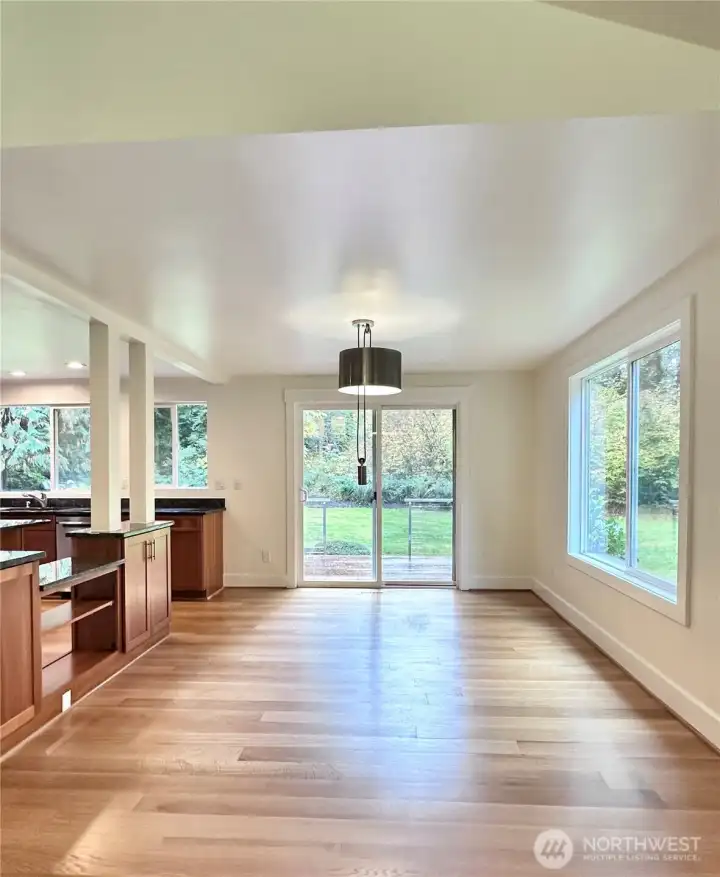 This home has an amazing feel and great flow with serene views all around. Enjoy gazing out at the extremely private back and side yard from the oversized windows and sliding door in the large dining room space.