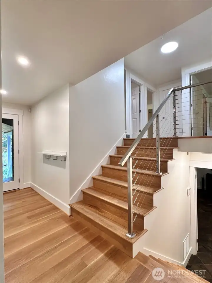 Stainless steel railings add a modern touch to this timeless home.