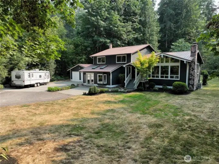 With just under 1.6 acres this amazing home is in the middle of a private park!