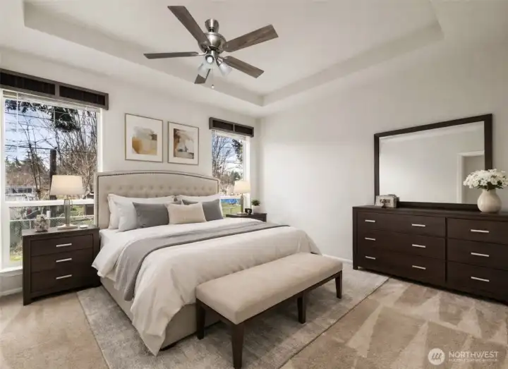 Spacious primary bedroom provides a peaceful retreat with room for a sitting area and additional furnishings.
