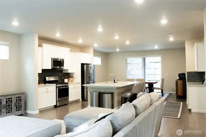 Seamless flow from living room into the kitchen and dining spaces, perfect for entertaining