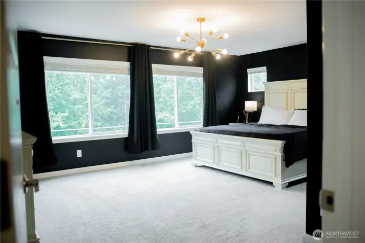 Spacious primary bedroom suite